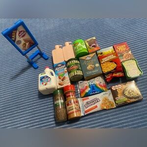 17 ct. Zuru Mini Brands bundle with sign